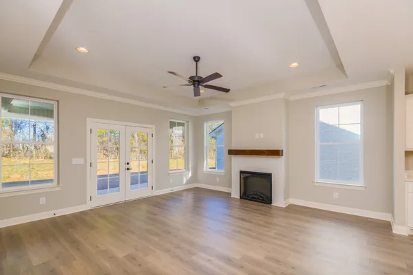 a view of a livingroom with wooden floor