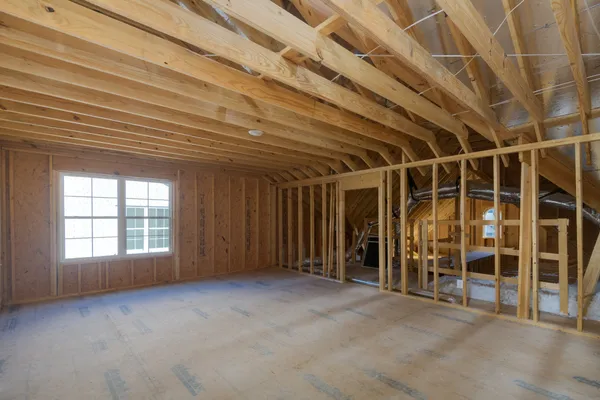 a view of a room with wooden walls