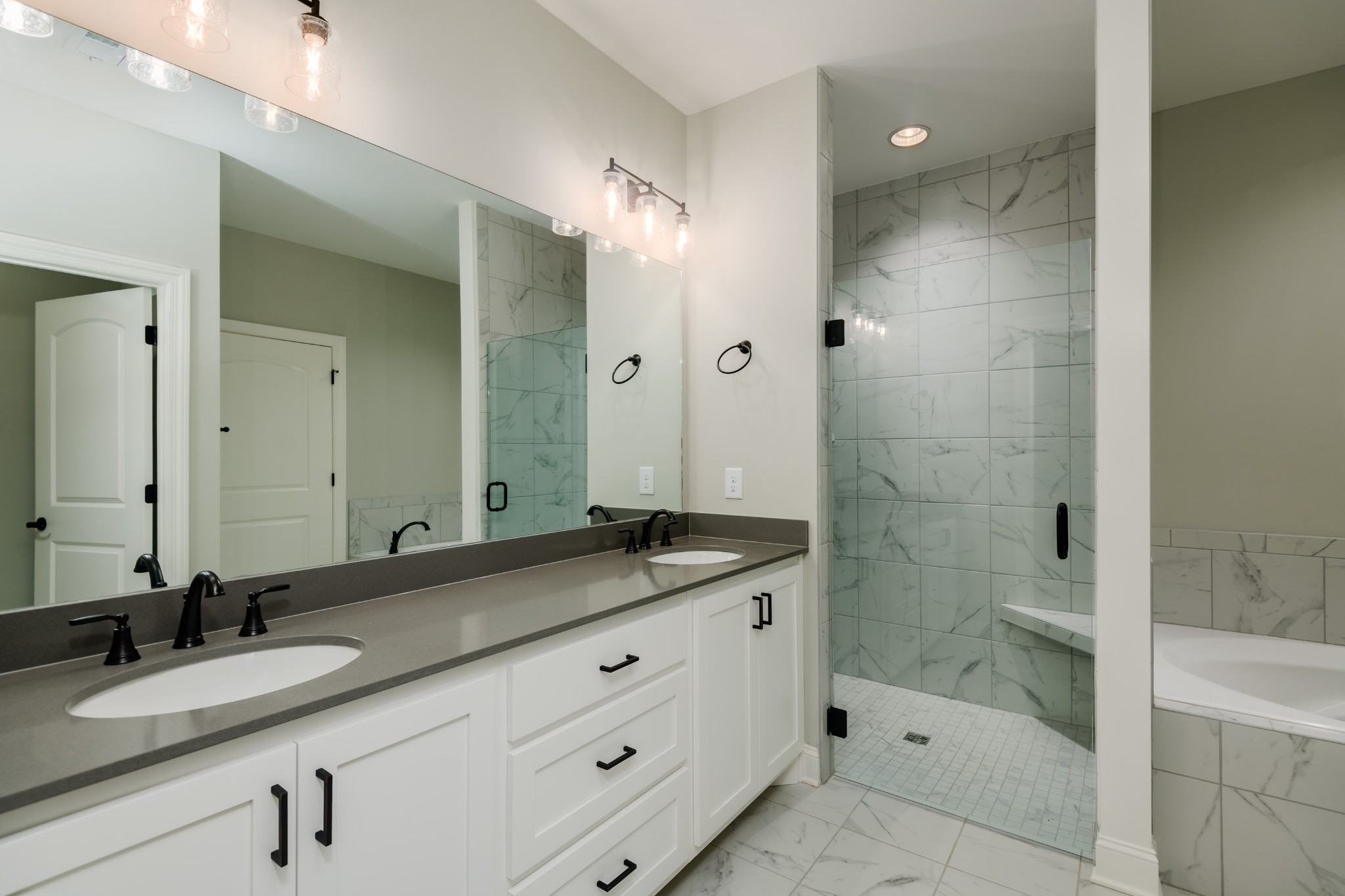 2290 Midland Road, Unit 7A Shelbyville, TN 37160 - Photo 10 of 44 a bathroom with a granite countertop sink mirror and shower