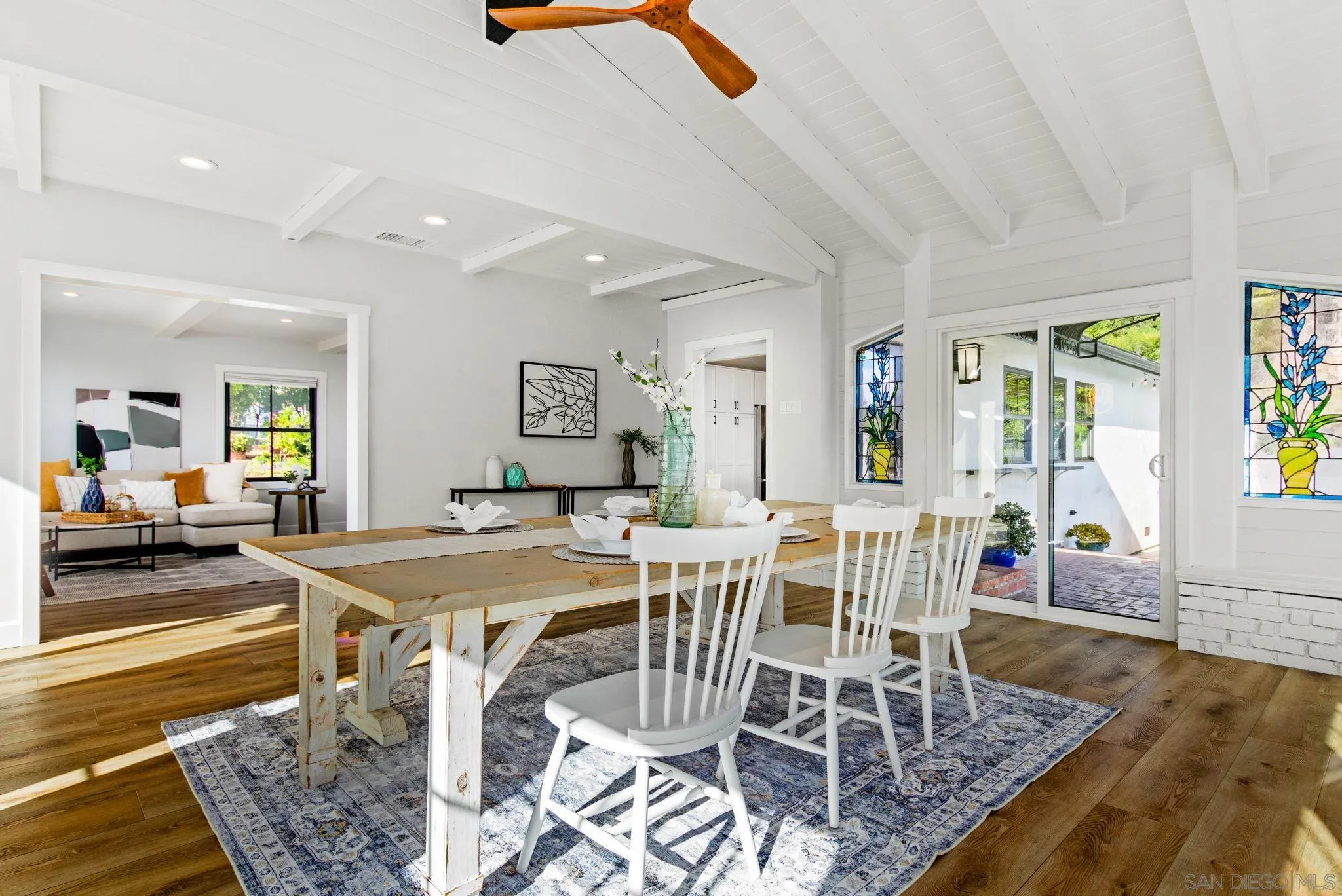 2335 Ivy Road Oceanside, CA 92054 - Photo 10 of 53 a view of a dining room with furniture