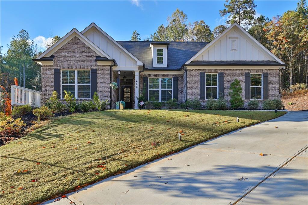 448 Springlake Road Lawrenceville, GA 30046 - Photo 1 of 1 a front view of a house with a yard