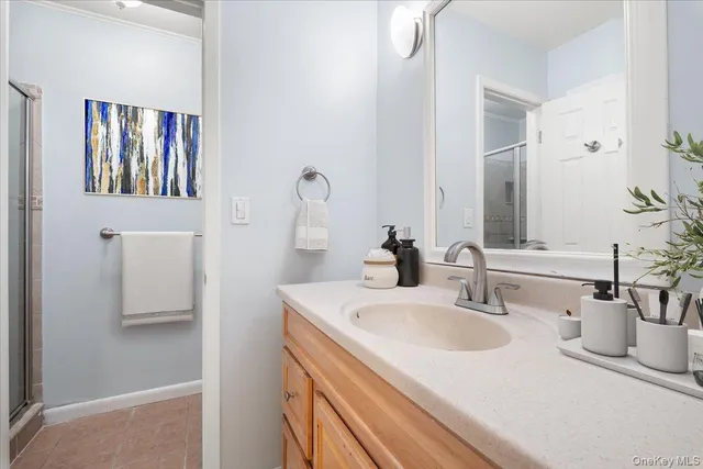 a bathroom with a sink and a mirror