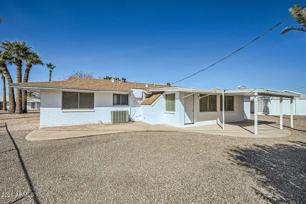 front view of a house with a patio