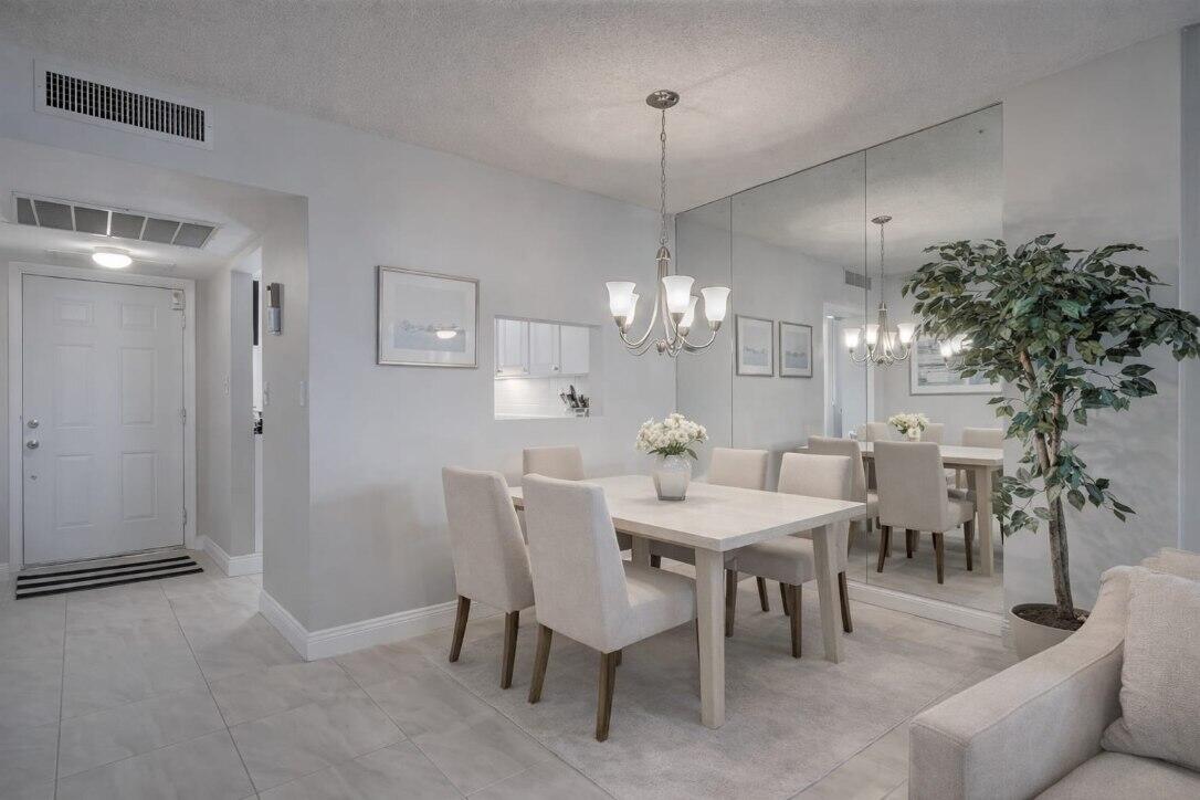 4500 North Federal Highway, Unit 121C Lighthouse Point, FL 33064 - Photo 5 of 14 a view of a dining room with furniture