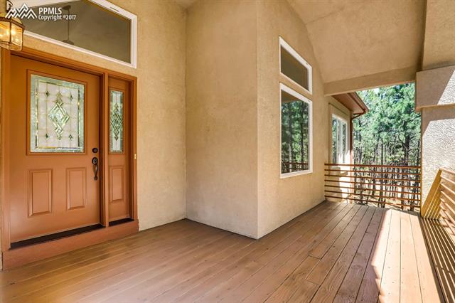 17850 Smugglers Road Monument, CO 80132 - Photo 4 of 28 Covered front porch