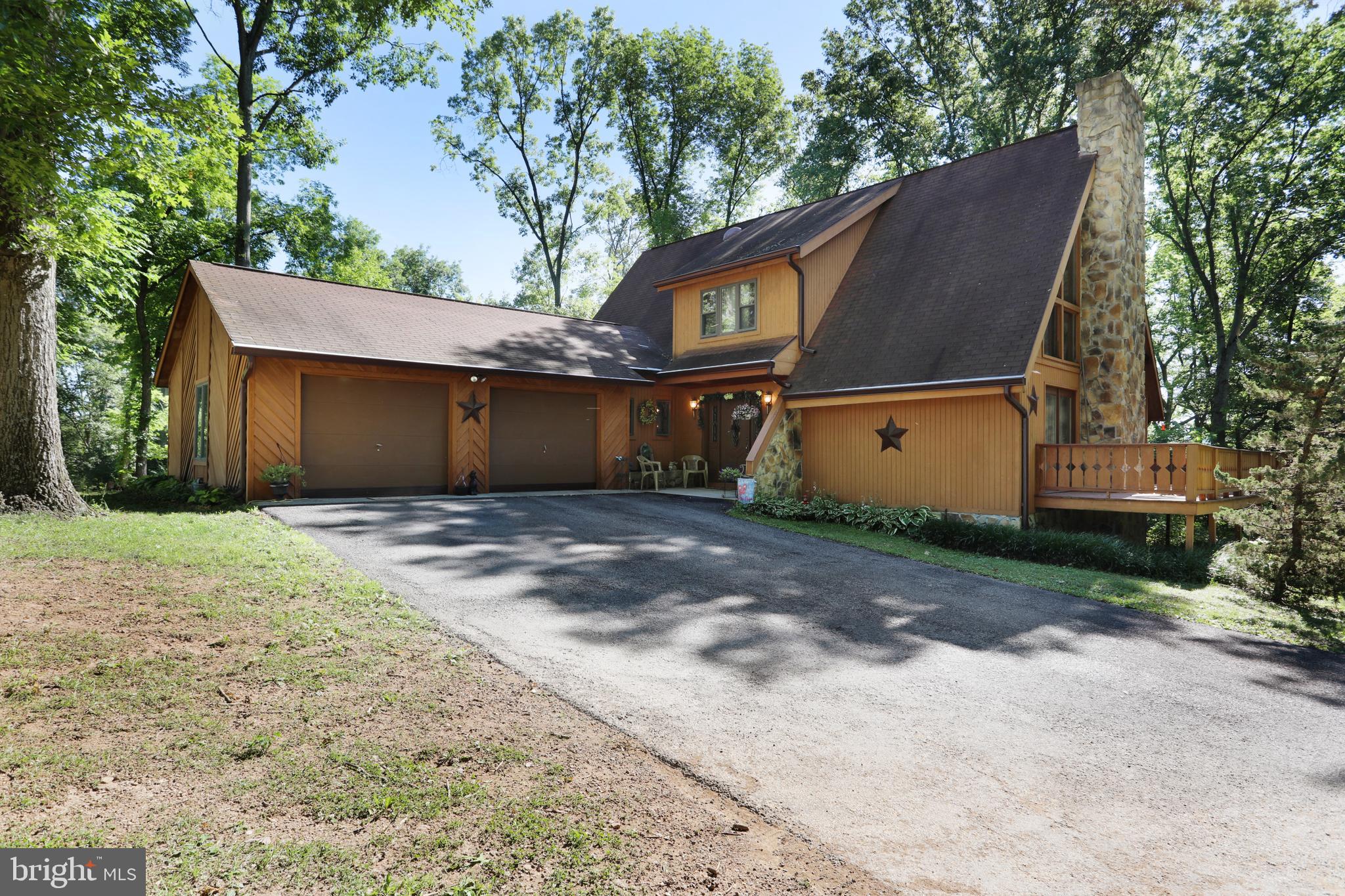 2919 Koontztown Road Falling Waters, WV 25419 - Photo 37 of 42 2 car garage with plenty of parking