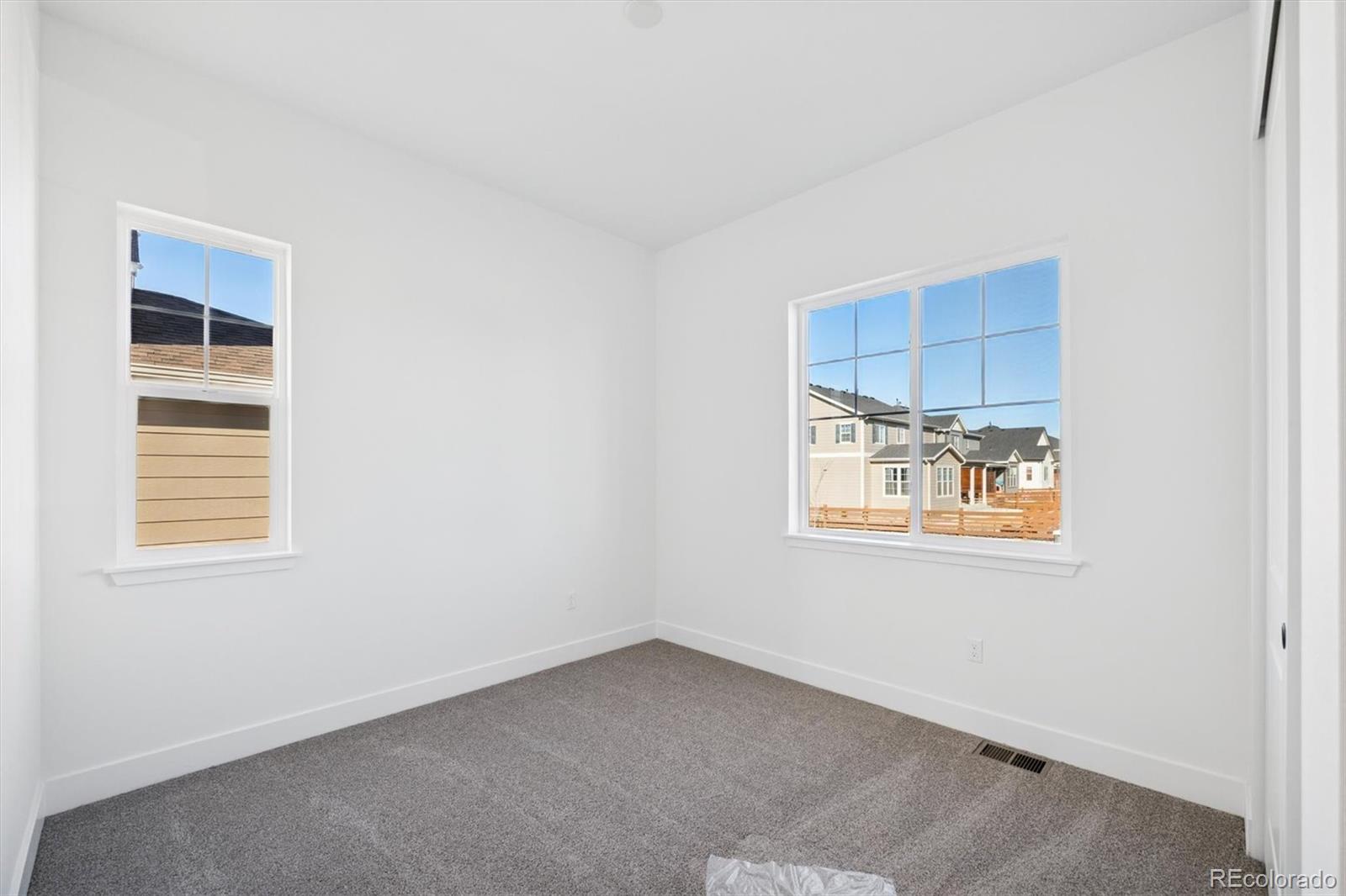 1242 Summit Rise Drive Erie, CO 80516 - Photo 3 of 25 a view of an empty room with a window