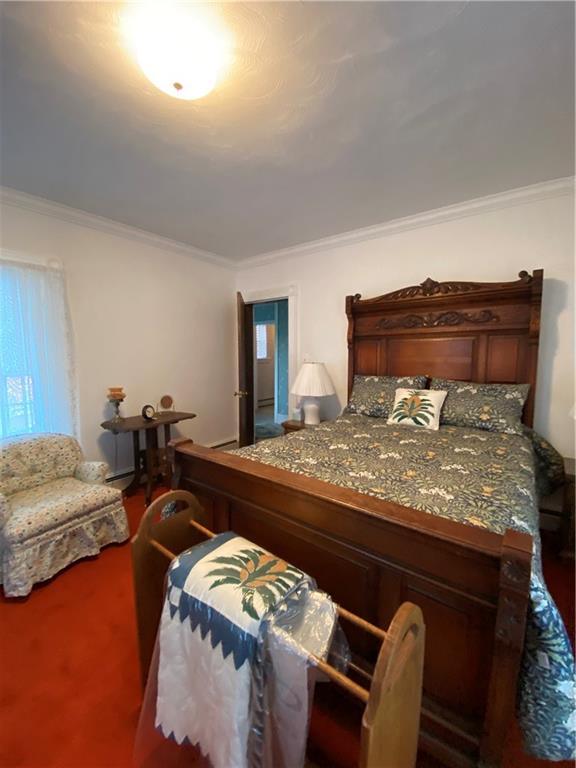 147 Warren Road Franklin, PA 16323 - Photo 32 of 40 a bed sitting in a bedroom next to a larger window
