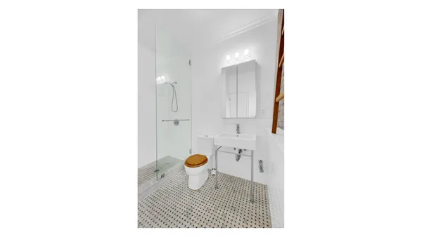 a view of bathroom and a sink