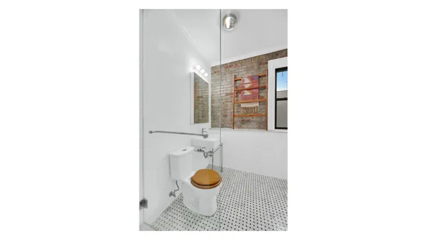 a bathroom with a sink and mirror