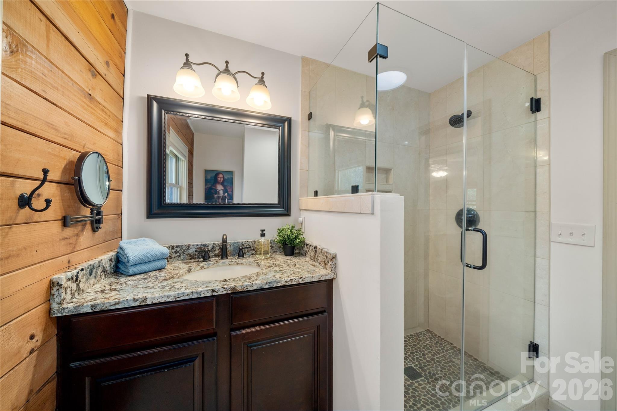 37 Cherokee Trail Fletcher, NC 28732 - Photo 13 of 34 a bathroom with a granite countertop sink shower and a mirror