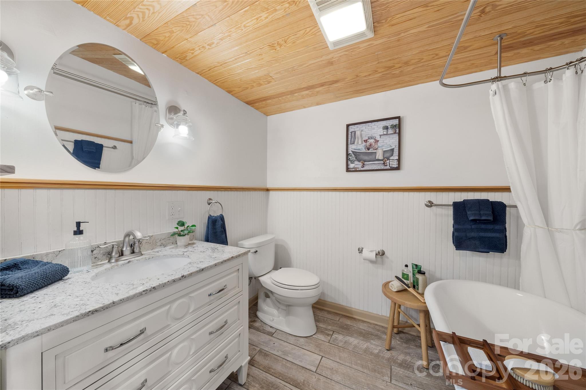 37 Cherokee Trail Fletcher, NC 28732 - Photo 22 of 34 a spacious bathroom with a granite countertop sink and a mirror