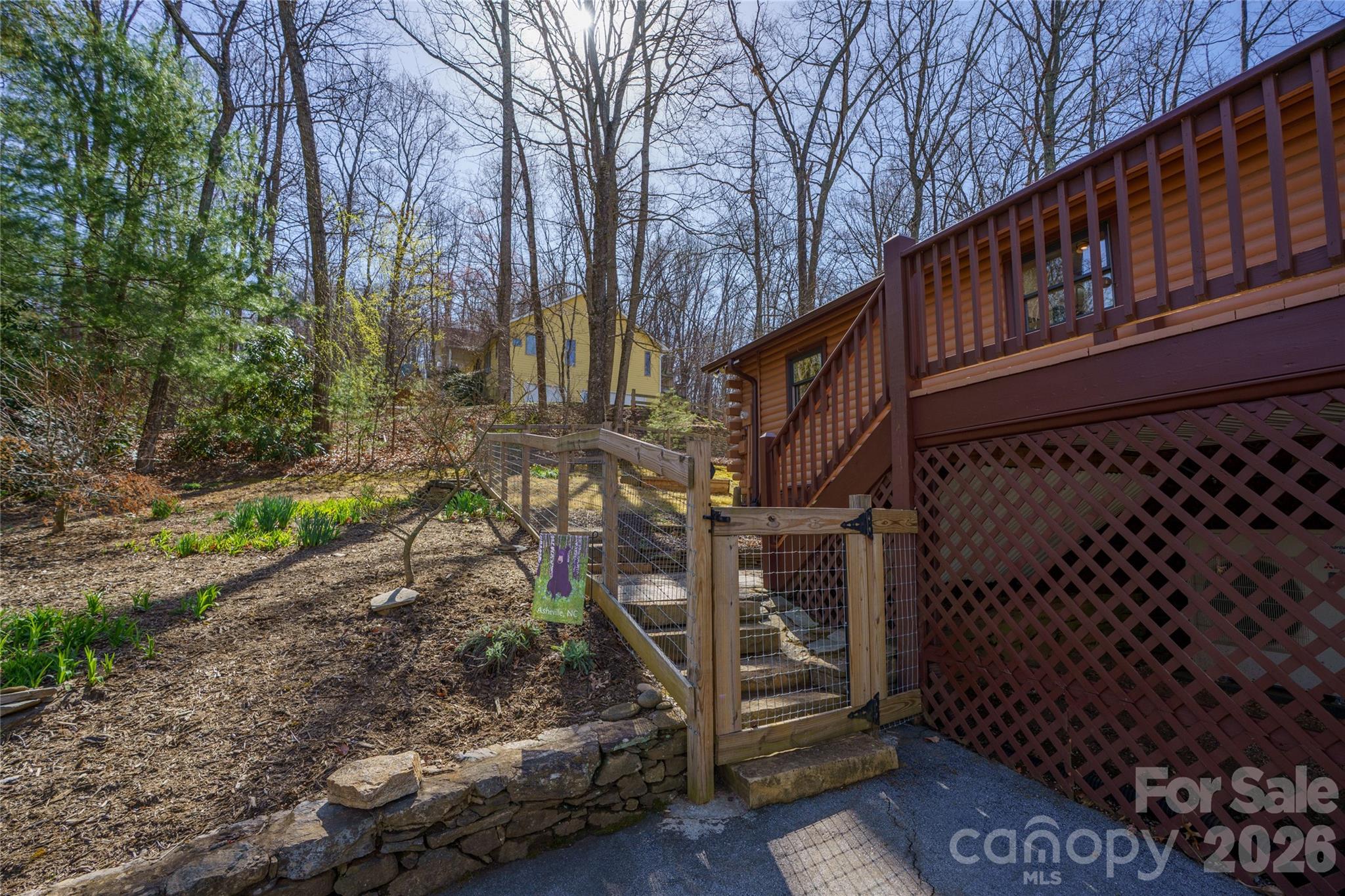 37 Cherokee Trail Fletcher, NC 28732 - Photo 27 of 34 a backyard of a house with lots of green space