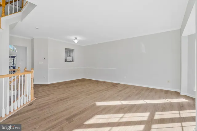 a view of a livingroom with wooden floor