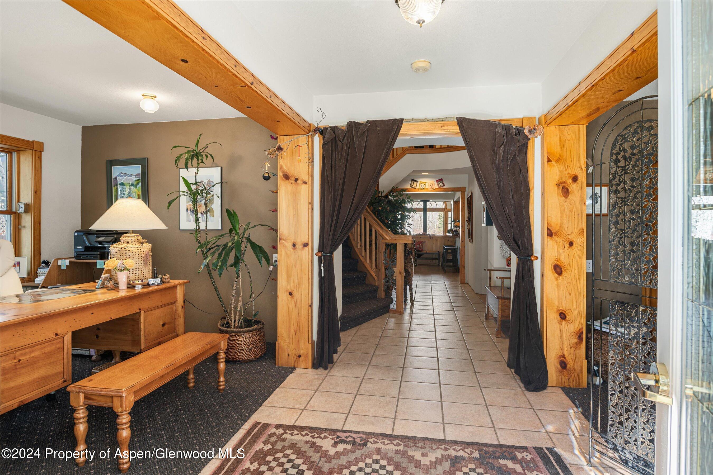 475 Redstone Boulevard Redstone, CO 81623 - Photo 12 of 27 a living room with a furniture and a rug