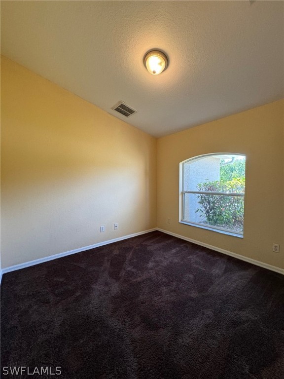 1841 Landale Loop Lehigh Acres, FL 33972 - Photo 19 of 21 a view of an empty room with a window