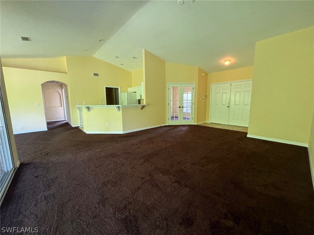 1841 Landale Loop Lehigh Acres, FL 33972 - Photo 2 of 21 a view of an empty room with a fireplace