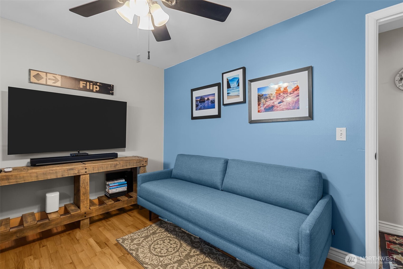 11462 35th Avenue Southwest Seattle, WA 98146 - Photo 15 of 26 a living room with furniture and a flat screen tv