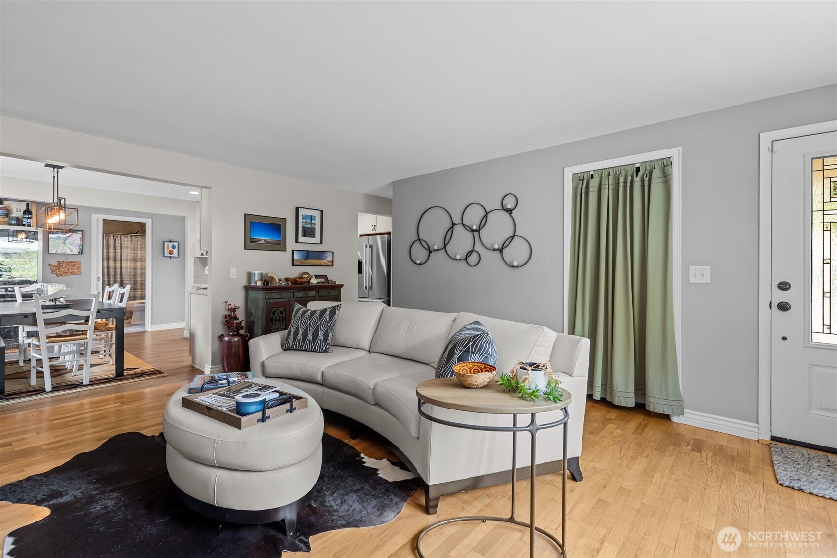 11462 35th Avenue Southwest Seattle, WA 98146 - Photo 2 of 26 a living room with furniture and a table