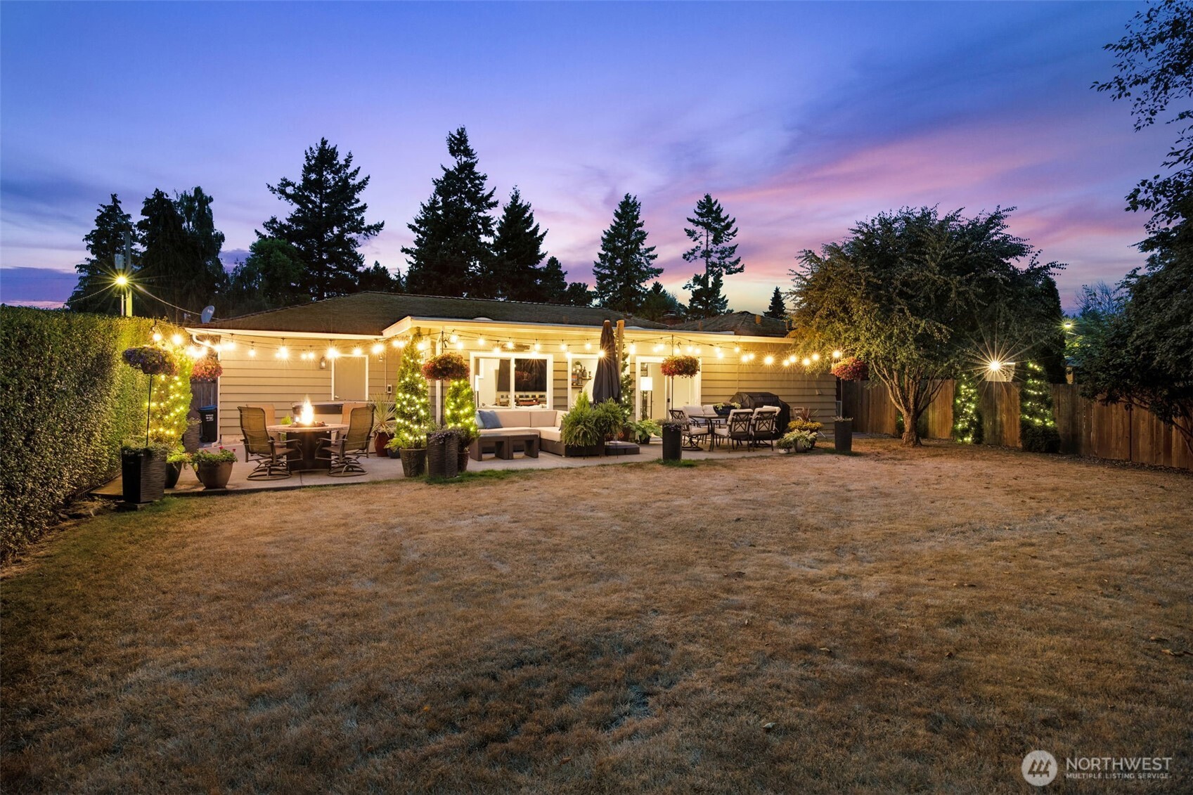 11462 35th Avenue Southwest Seattle, WA 98146 - Photo 22 of 26 a view of a house with a yard