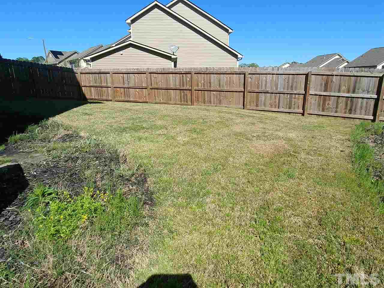 2716 Communion Court Raleigh, NC 27610 - Photo 16 of 17 a view of a backyard
