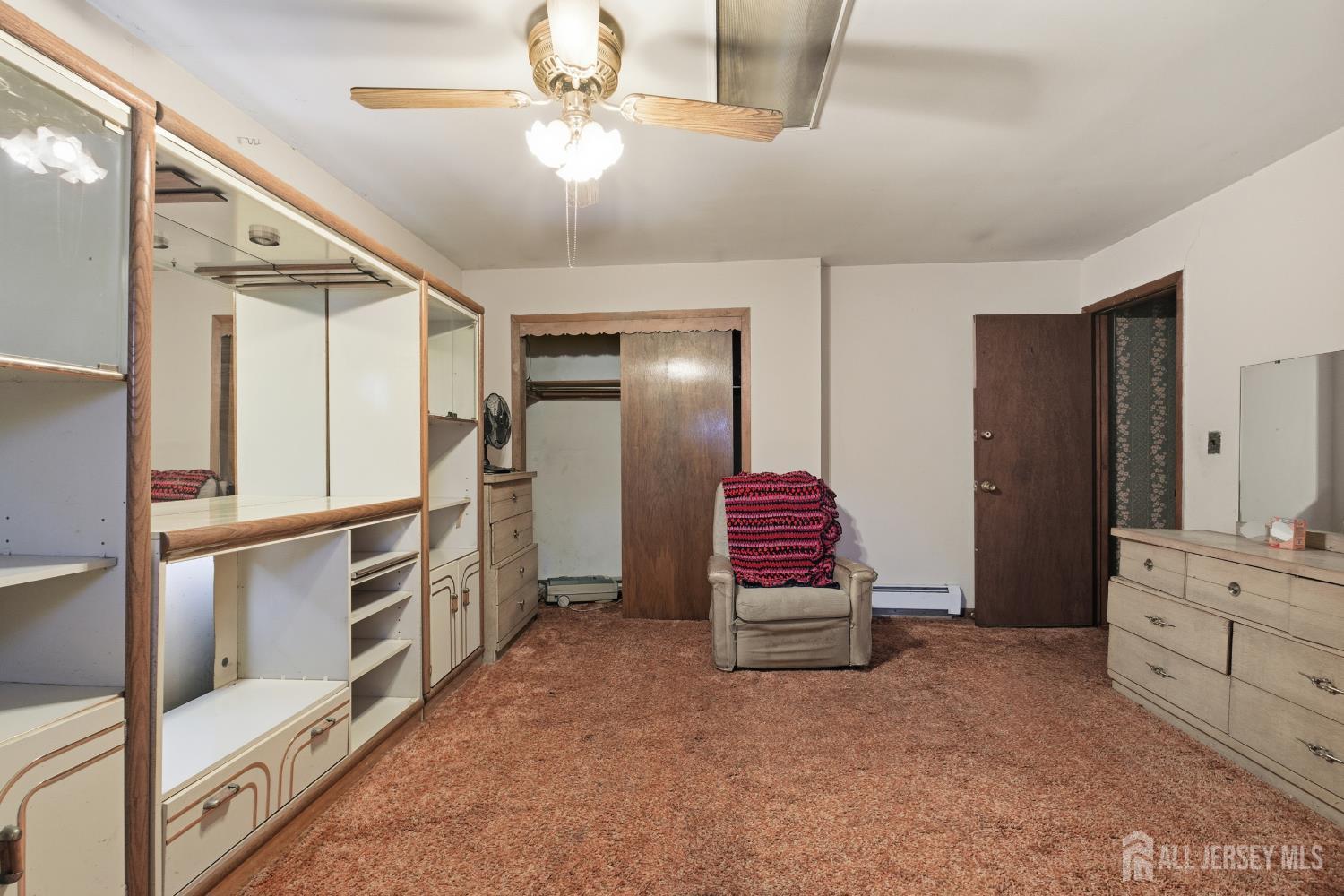 17 Birch Street Old Bridge, NJ 08857 - Photo 11 of 22 a view of kitchen with furniture and a ceiling fan