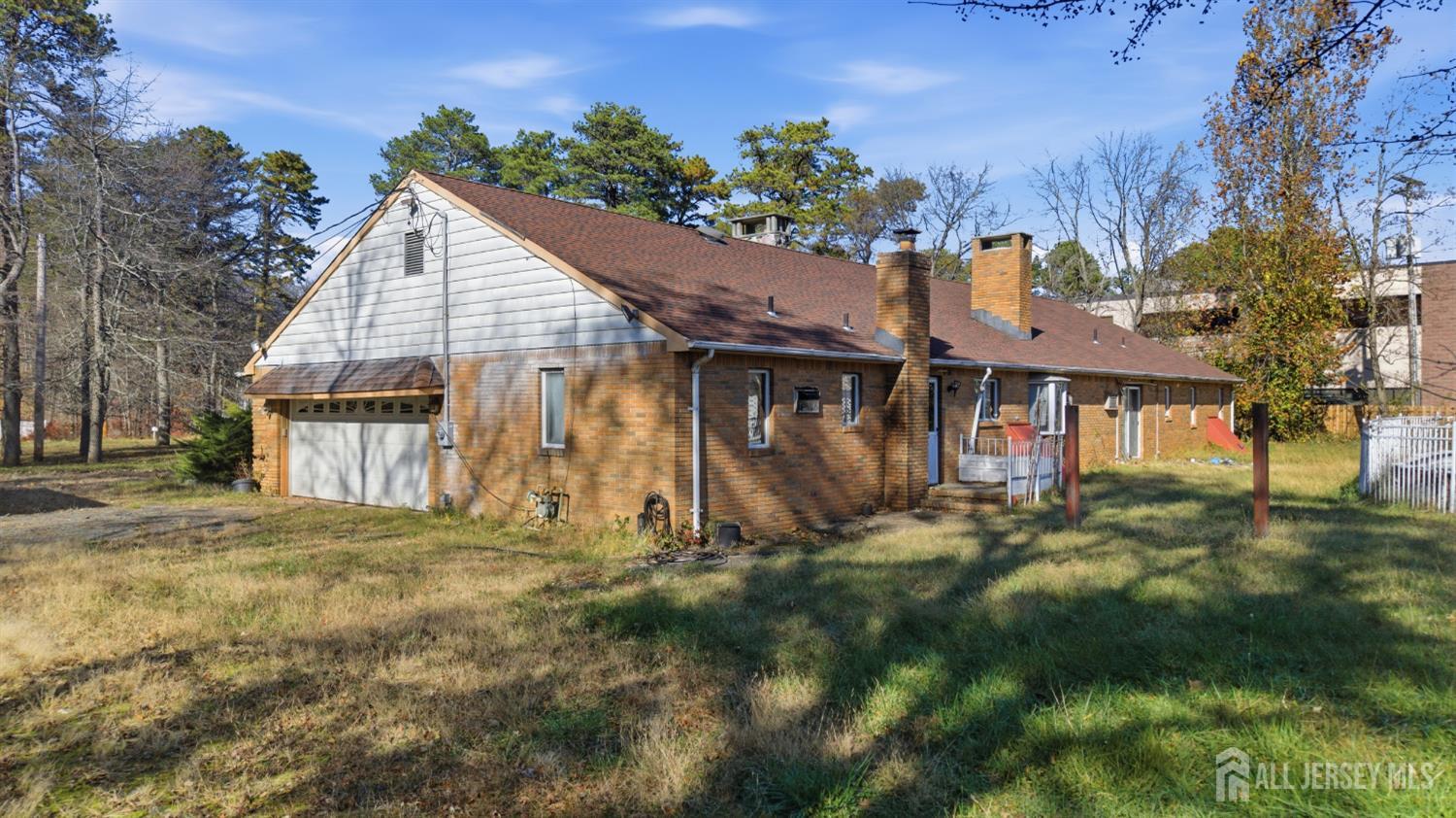 17 Birch Street Old Bridge, NJ 08857 - Photo 16 of 22 a view of a house with a yard and potted plants