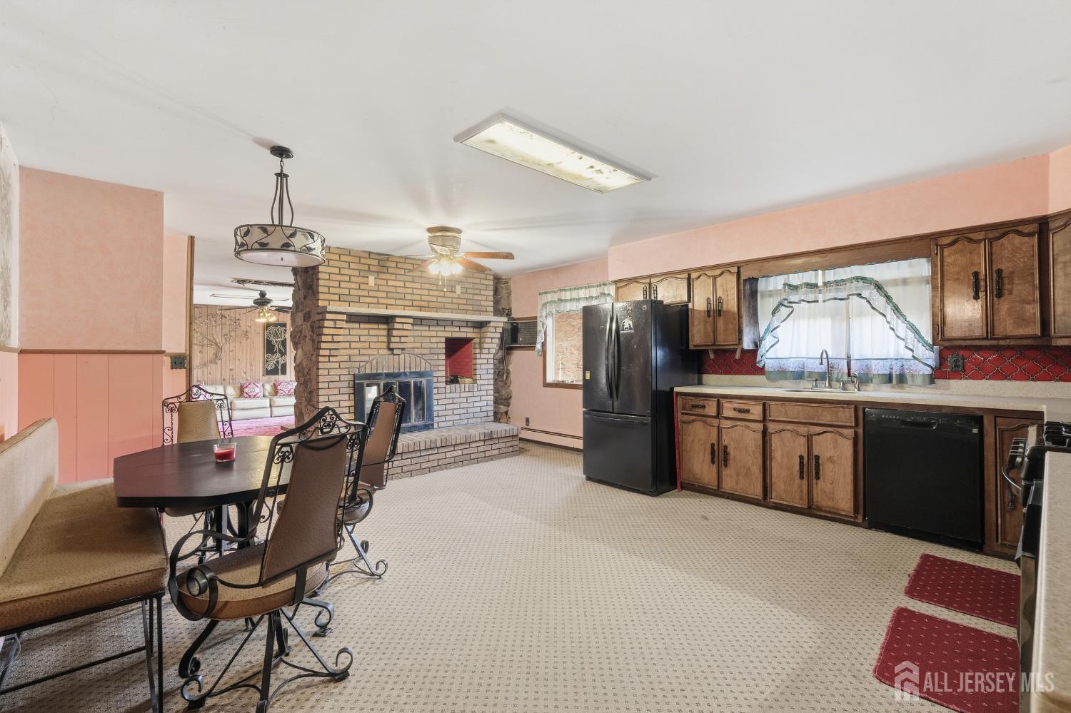 17 Birch Street Old Bridge, NJ 08857 - Photo 8 of 22 a kitchen with stainless steel appliances kitchen island granite countertop a sink and cabinets