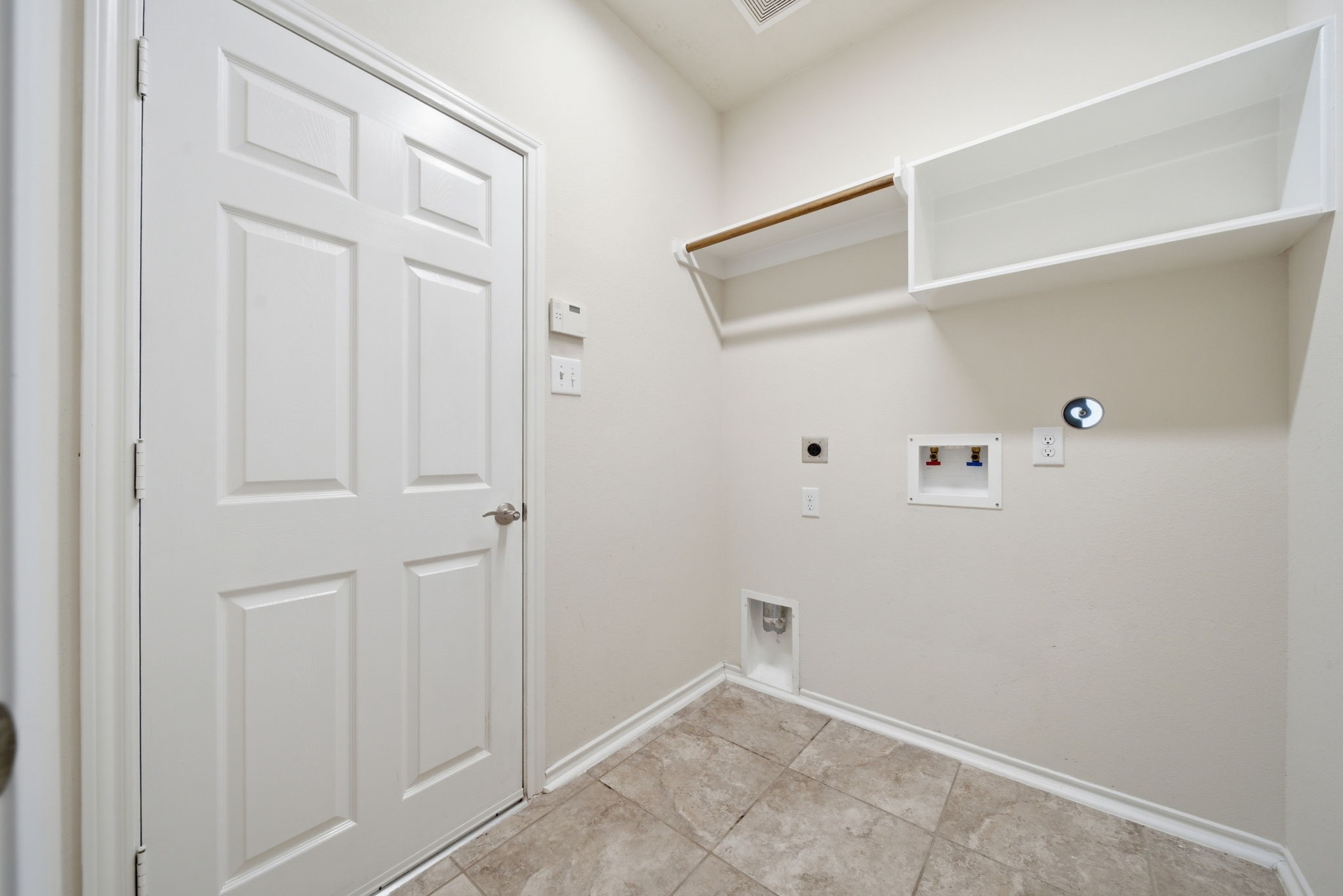 123 North Hawkhurst Circle Magnolia, TX 77354 - Photo 26 of 40 The laundry room is conveniently located by the garage.