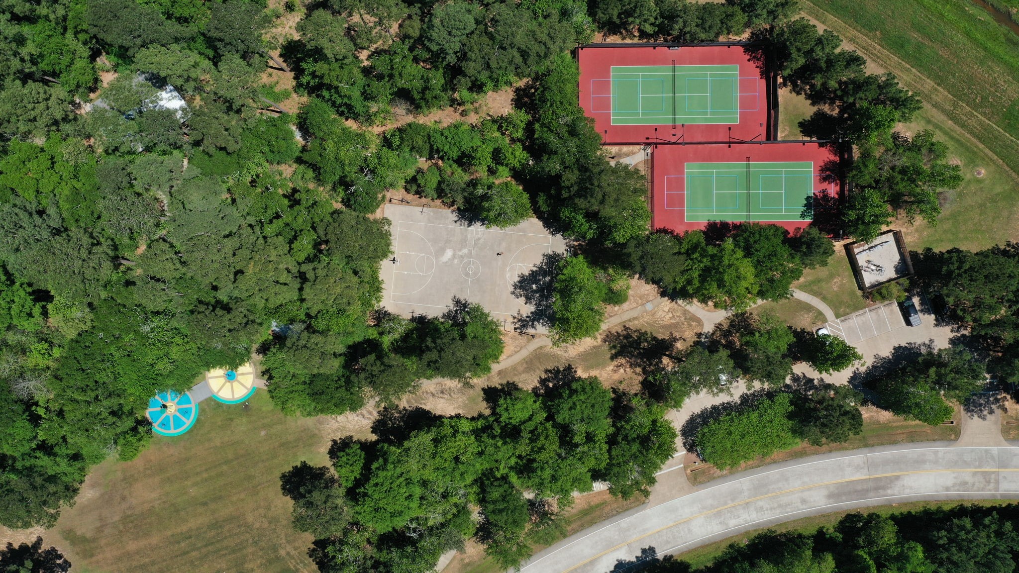 123 North Hawkhurst Circle Magnolia, TX 77354 - Photo 35 of 40 Walk to the 9-acre May Valley Park nearby. There's something for everyone to do here. There's a playground for the little ones, tennis, basketball, and a soccer field for the older crowd.