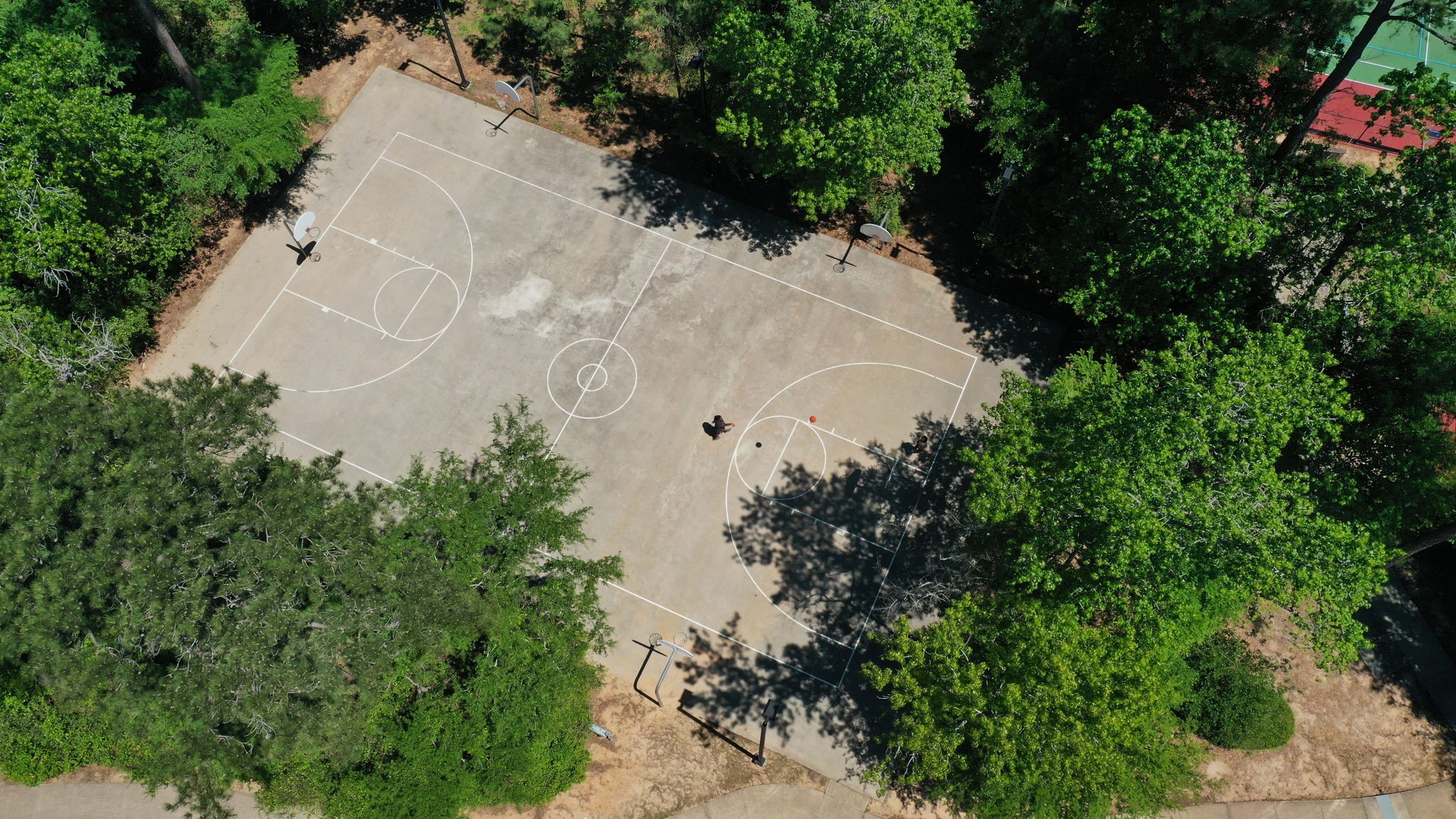 123 North Hawkhurst Circle Magnolia, TX 77354 - Photo 37 of 40 Full court basketball is available for the competitive crowd, or just practice shooting hoops here.