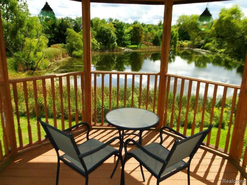 3145 Klam Road Columbiaville, MI 48421 - Photo 28 of 31 Deck Overlooking Pond