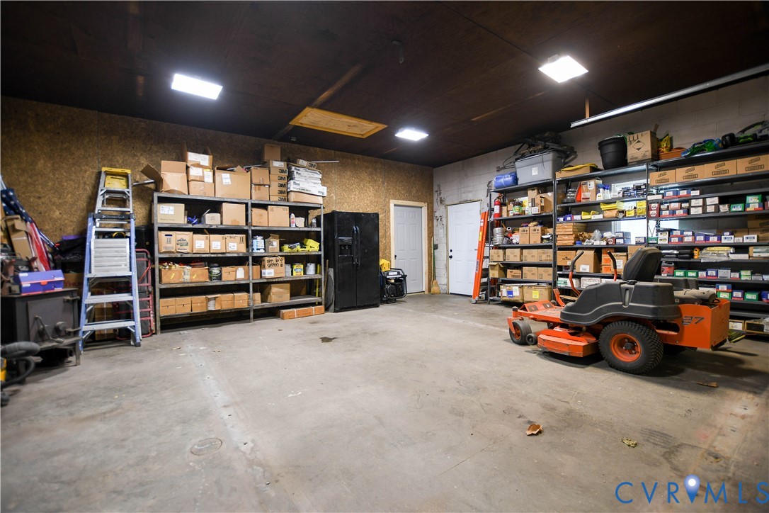1448 Canterbury Road St. Stephens Church, VA 23148 - Photo 46 of 57 Spacious utility garage featuring concrete floorin