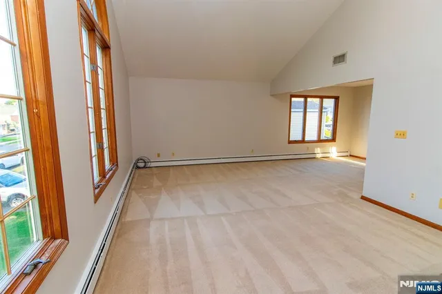 an empty room with windows