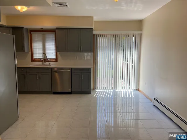 a view of kitchen with windows