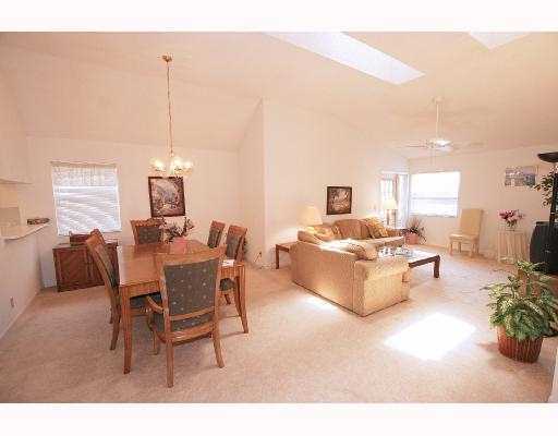 5359 Buckhead Circle Boca Raton, FL 33431 - Photo 2 of 8 a living room with furniture and a wooden floor