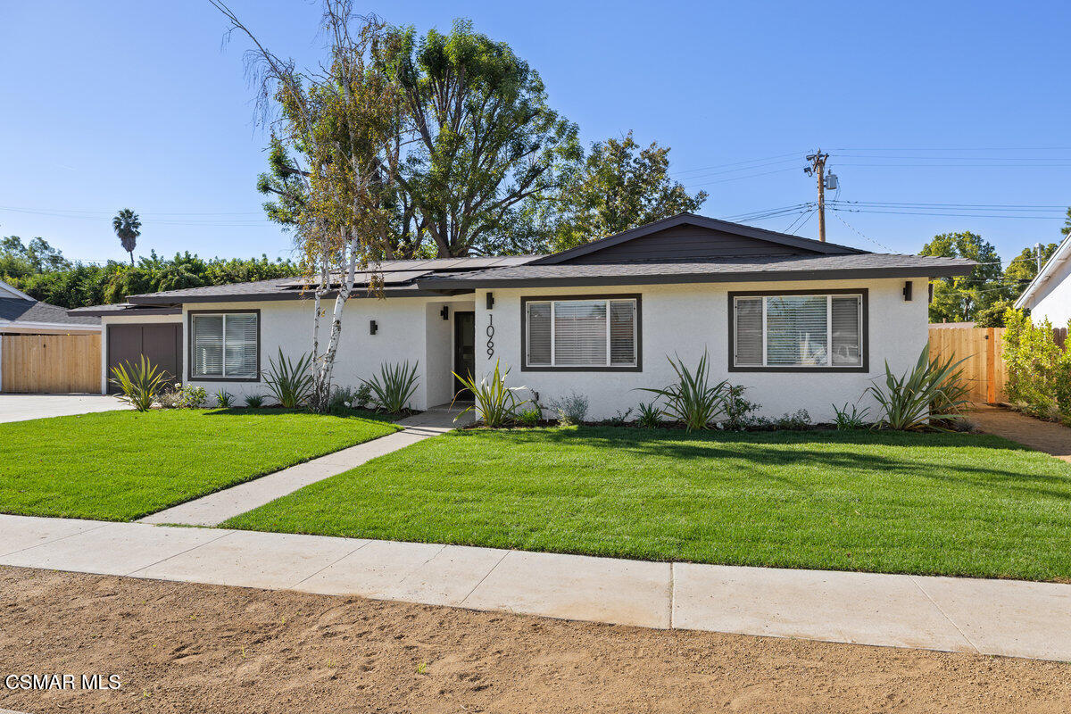 1069 Donner Avenue, Unit B Simi Valley, CA 93065 - Photo 1 of 7 a view of a house with a yard