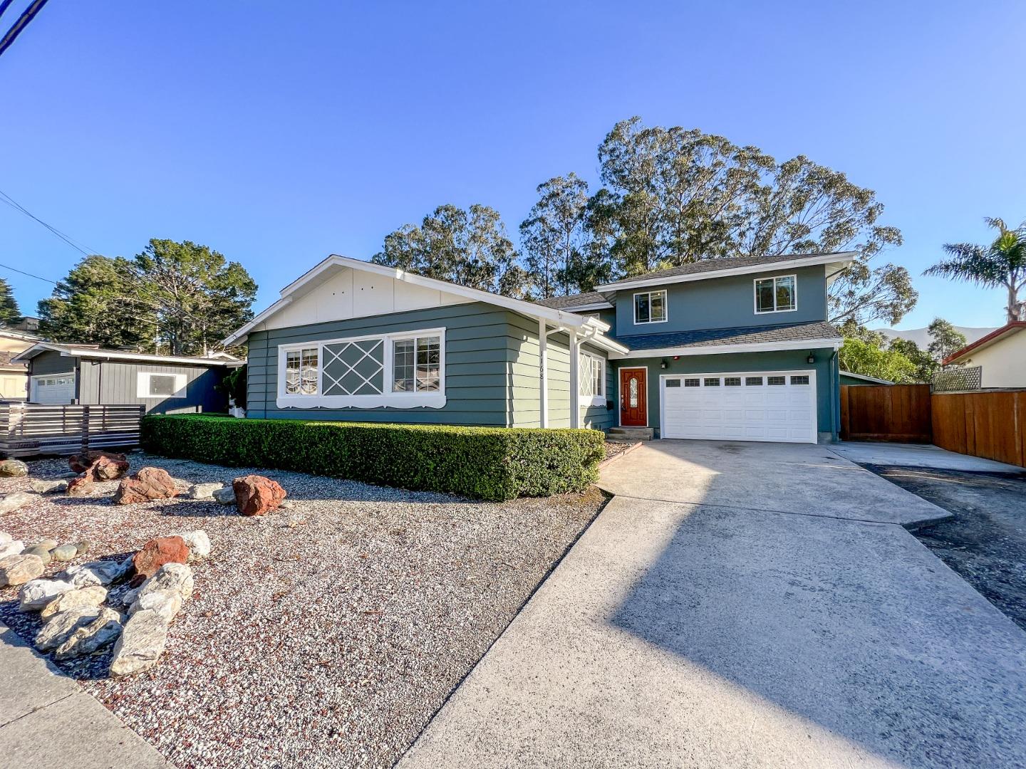 1168 Crespi Drive Pacifica, CA 94044 - Photo 1 of 42 a front view of a house with a yard