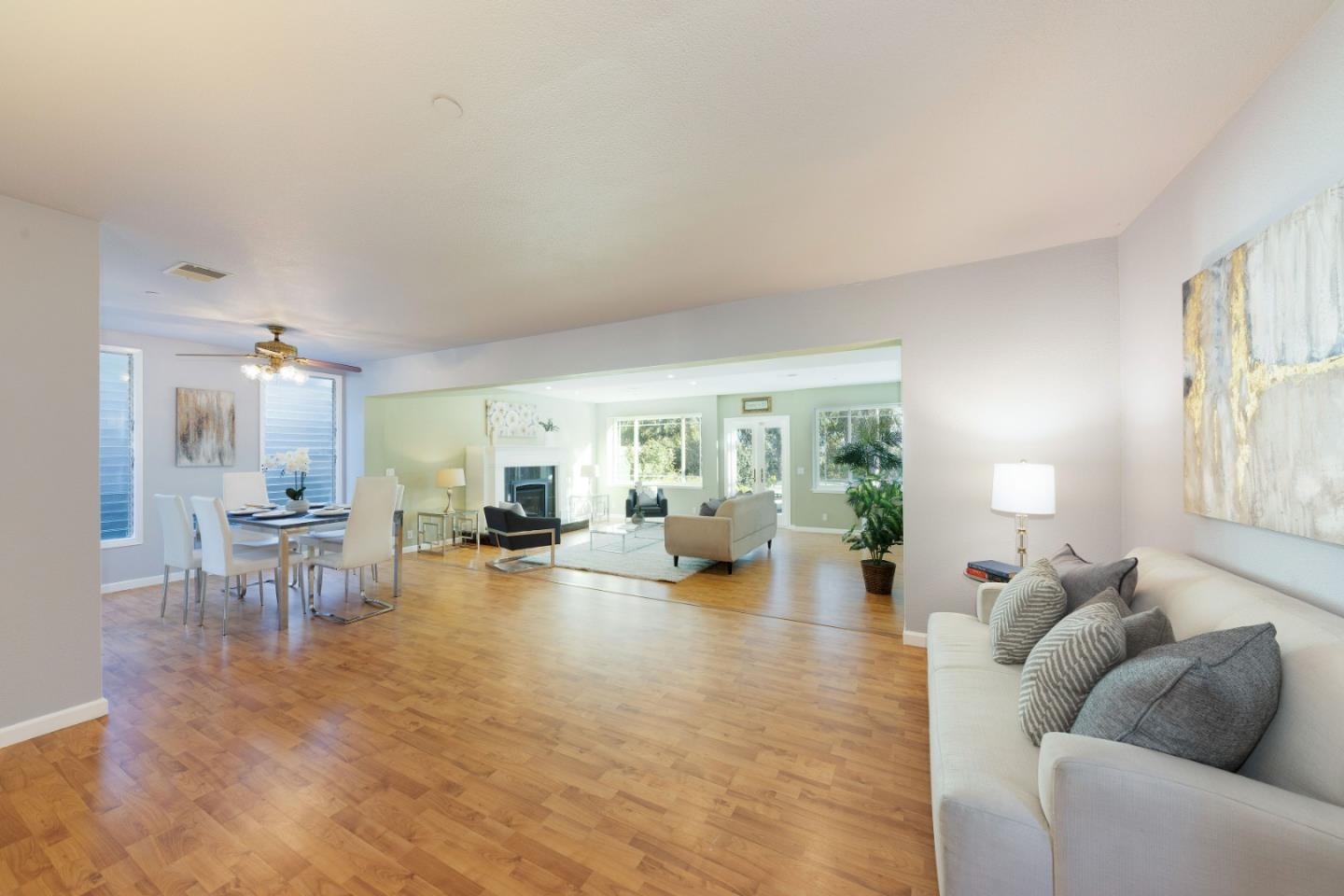 1168 Crespi Drive Pacifica, CA 94044 - Photo 2 of 42 a living room with furniture and a table with kitchen view