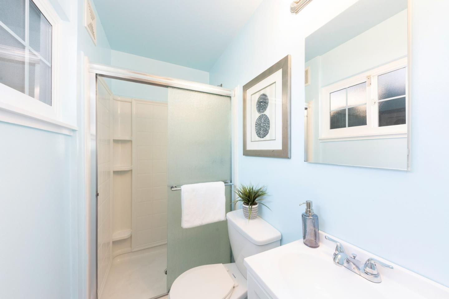 1168 Crespi Drive Pacifica, CA 94044 - Photo 23 of 42 a bathroom with a sink toilet and shower