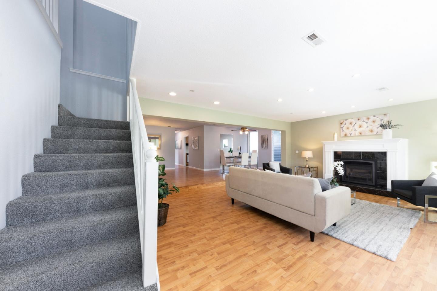1168 Crespi Drive Pacifica, CA 94044 - Photo 24 of 42 a living room with furniture and a fireplace