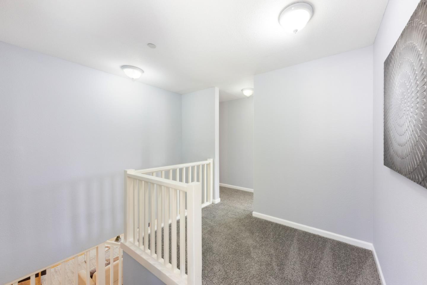 1168 Crespi Drive Pacifica, CA 94044 - Photo 25 of 42 a view of a hallway with staircase
