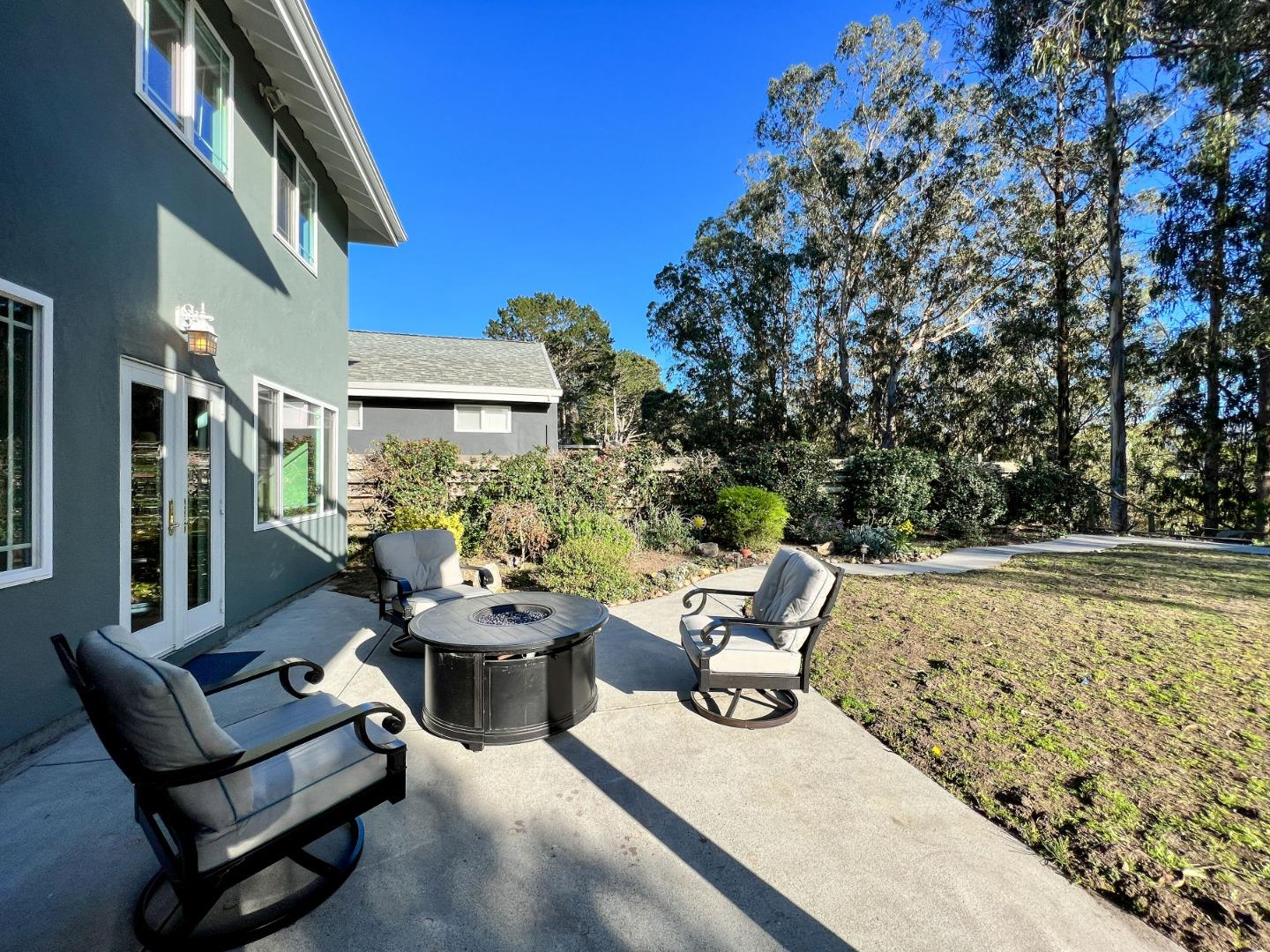 1168 Crespi Drive Pacifica, CA 94044 - Photo 34 of 42 a view of a patio with couches table and chairs and potted plants