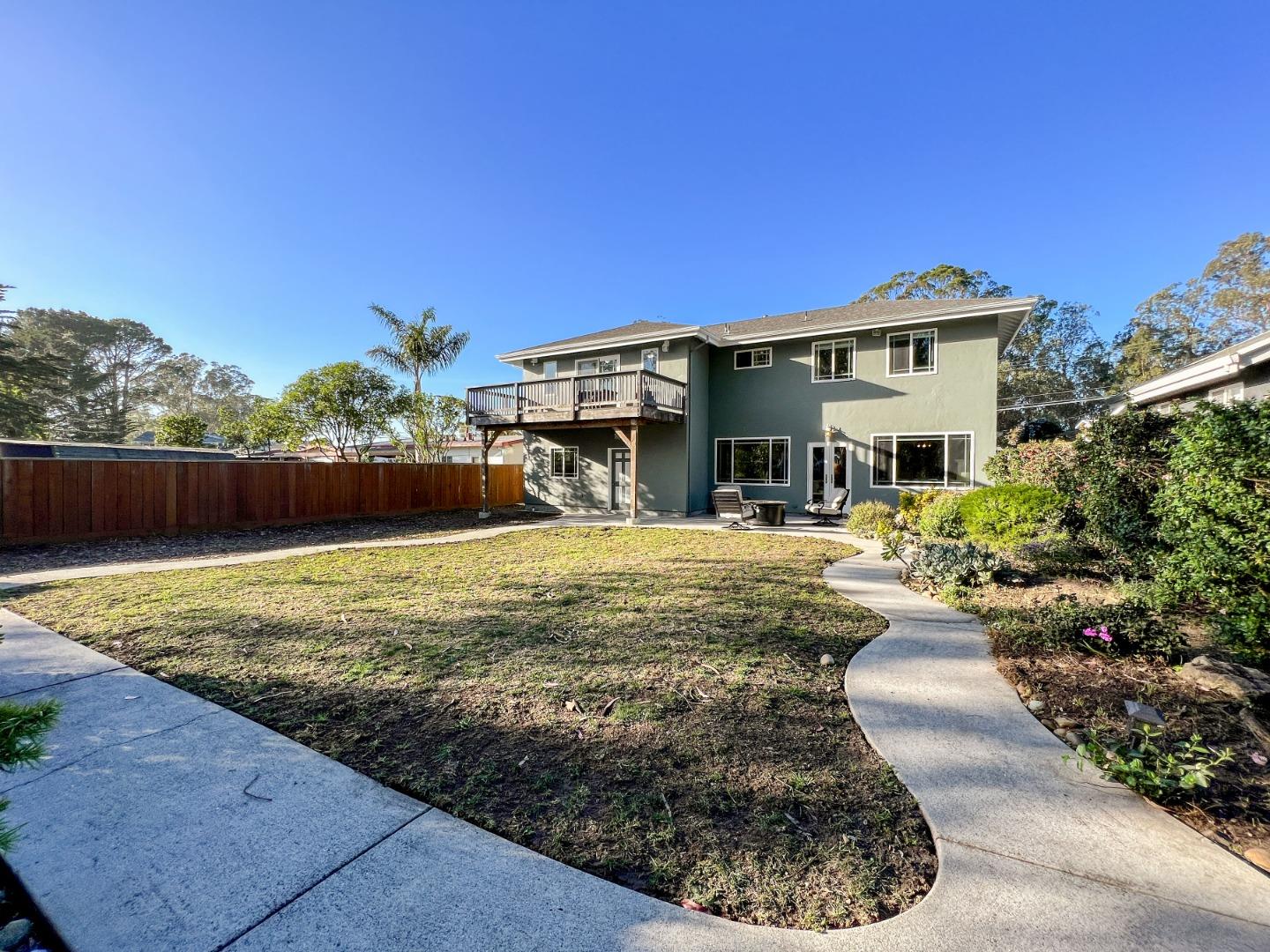 1168 Crespi Drive Pacifica, CA 94044 - Photo 36 of 42 a front view of a house with a yard