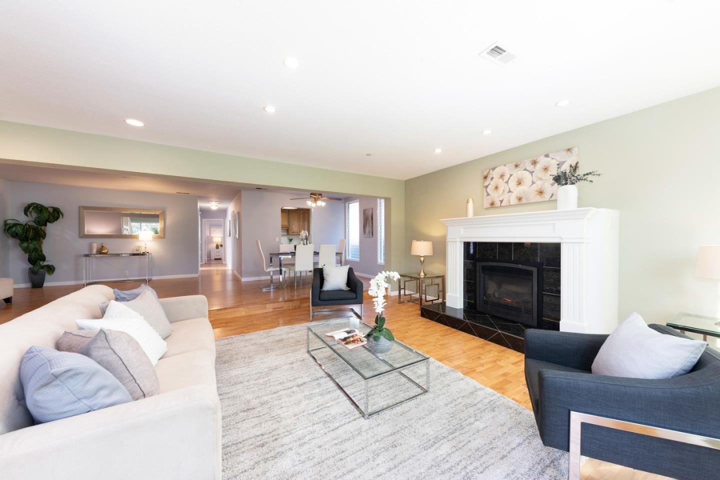 1168 Crespi Drive Pacifica, CA 94044 - Photo 5 of 42 a living room with furniture and a fireplace