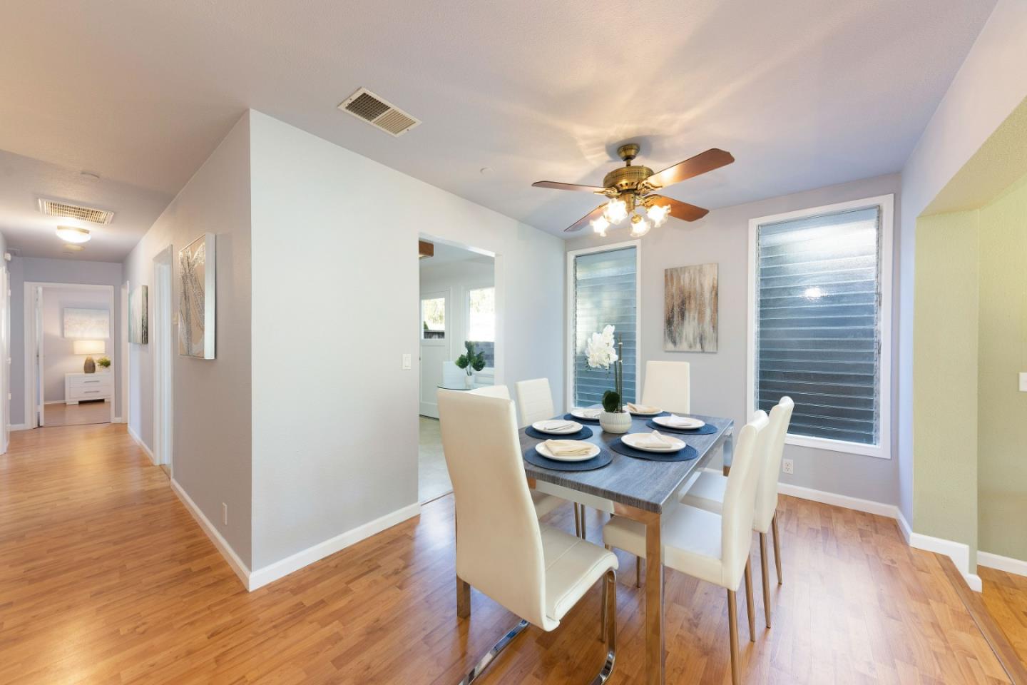 1168 Crespi Drive Pacifica, CA 94044 - Photo 9 of 42 a view of a dining room with furniture and wooden floor