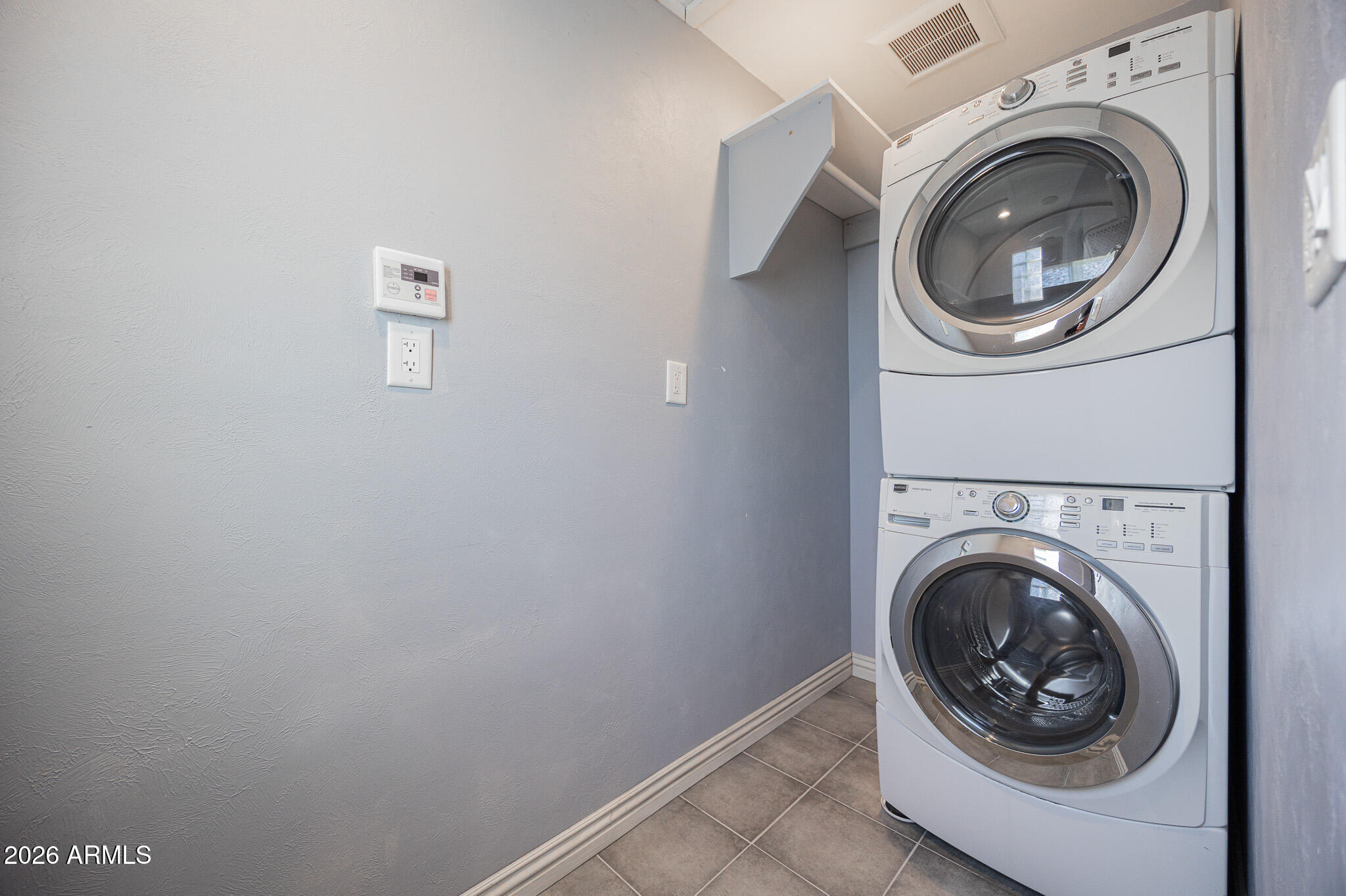 3137 North 4th Avenue Phoenix, AZ 85013 - Photo 28 of 36 a close up view of a washer and dryer