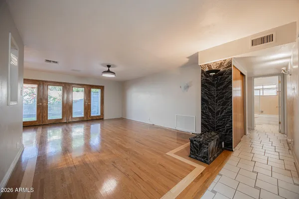 a view of an empty room and window