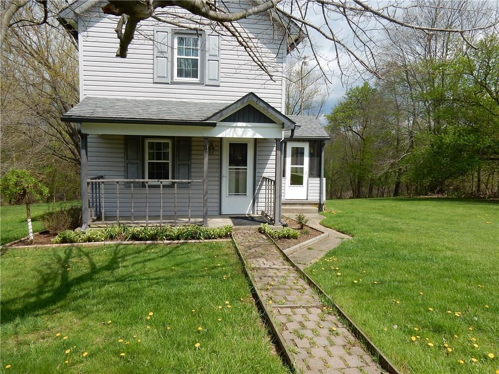 66 Wansack Road West Middlesex, PA 16159 - Photo 20 of 25 Attached side screened in porch