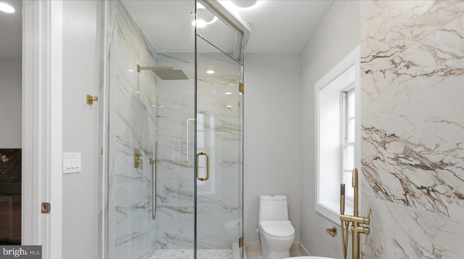 3517 Rodman Street Northwest Washington, DC 20008 - Photo 22 of 57 a bathroom with a shower and toilet